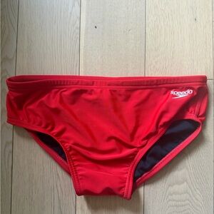Speedo Red and Black Swimwear. Sizing runs small (best for a 30 waist).